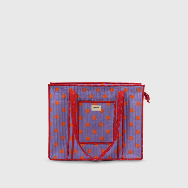Carry-All Tote Bag in Lavender Stat and Citrus, front view with handles raised.