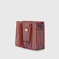 Carry-All Tote Bag in Clinic Blue and Night Grape, side view.
